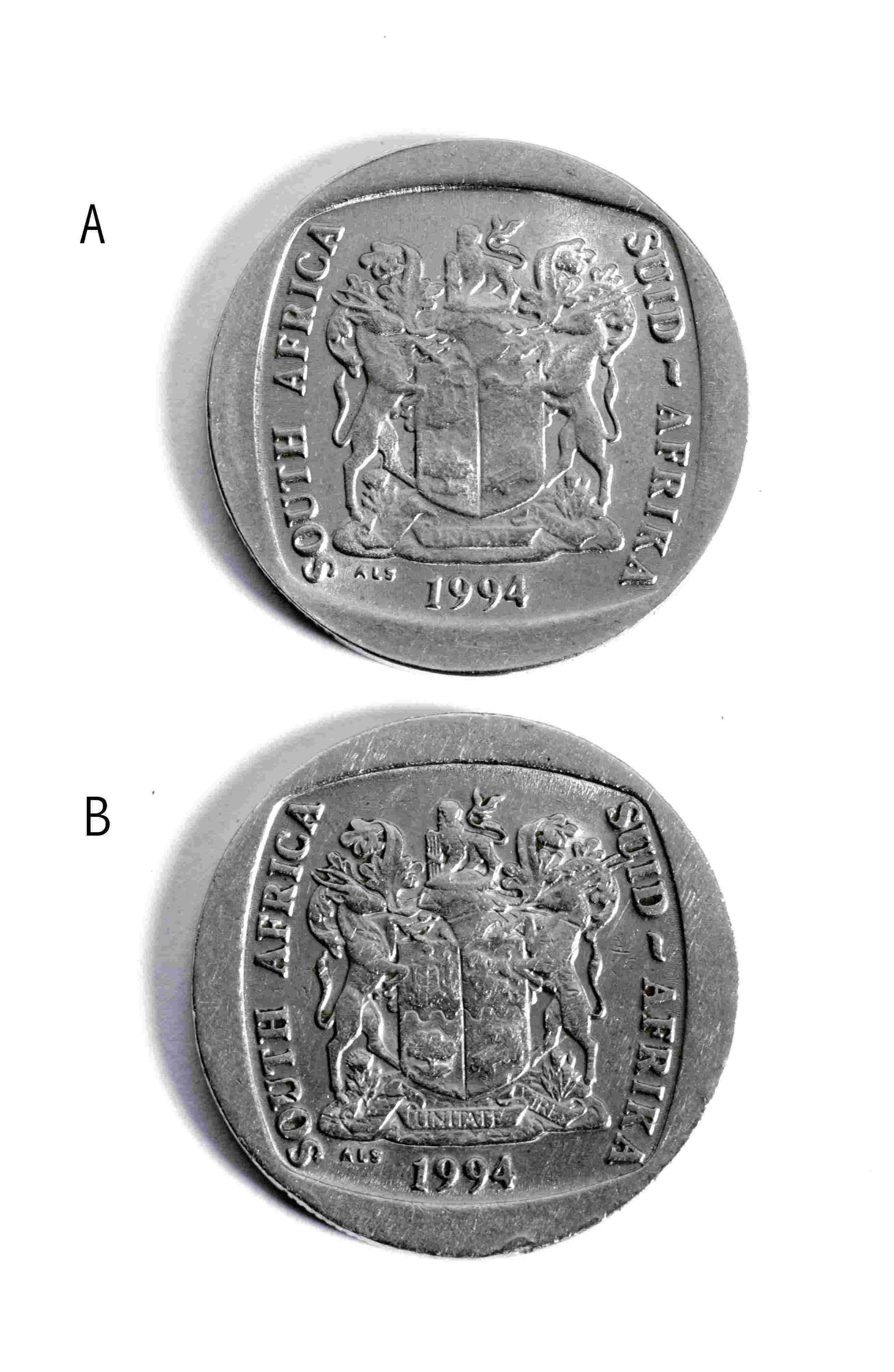  Comparison of counterfeit(A) and genuine(B) obverse sides of the R5